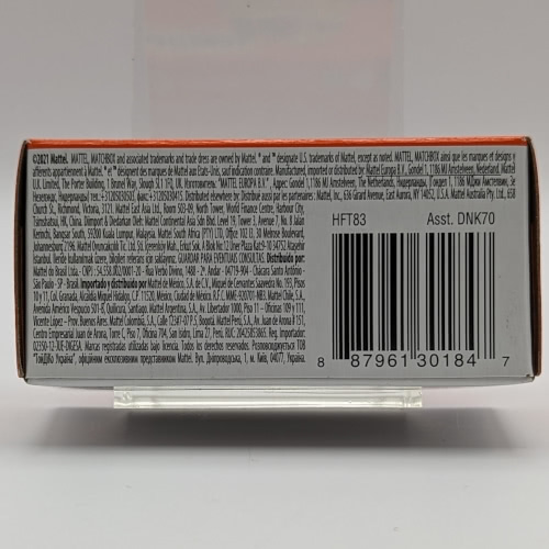 Bottom packaging of a Matchbox Power Grab box with the toy code encircled in red